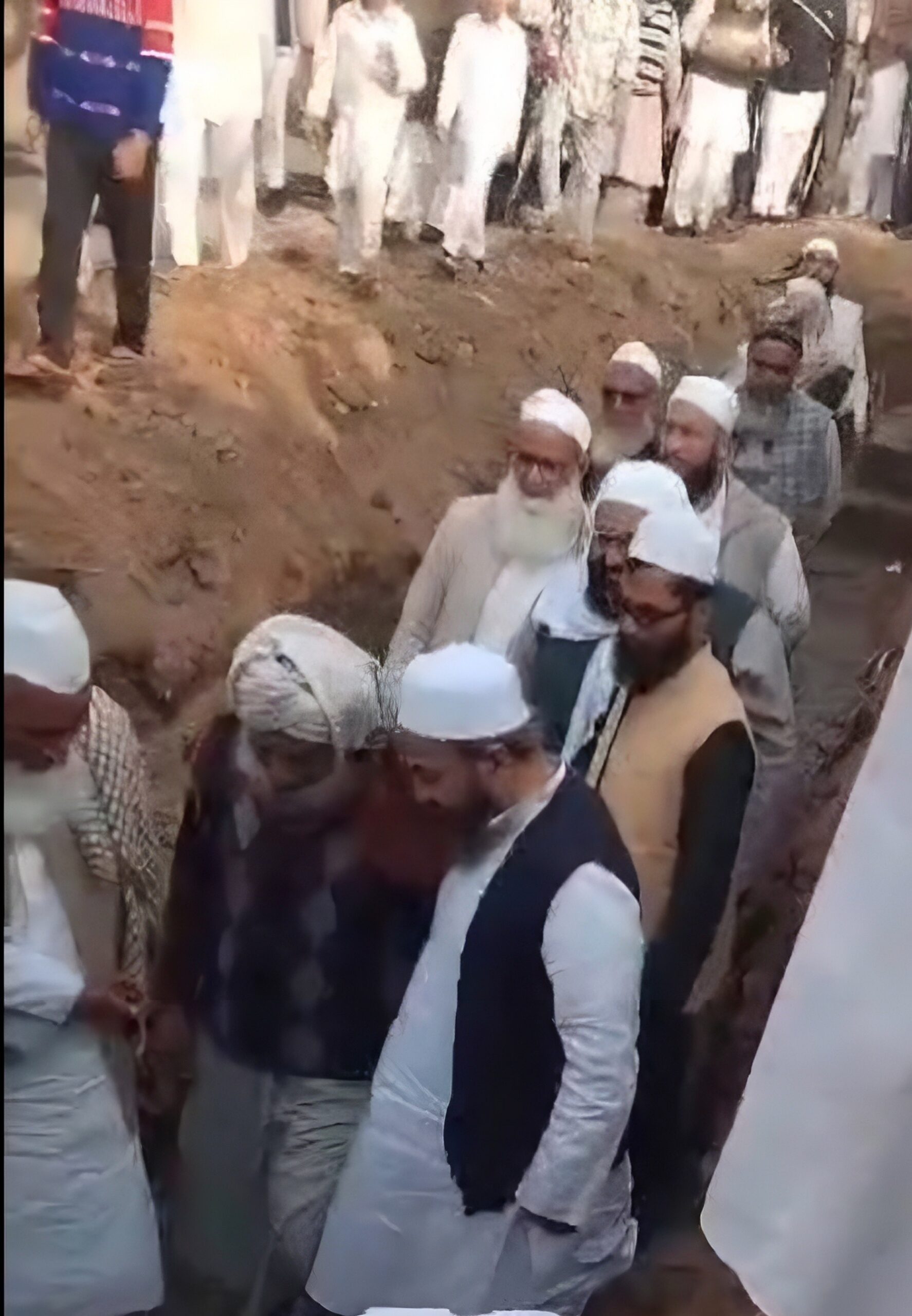People placing the first bricks